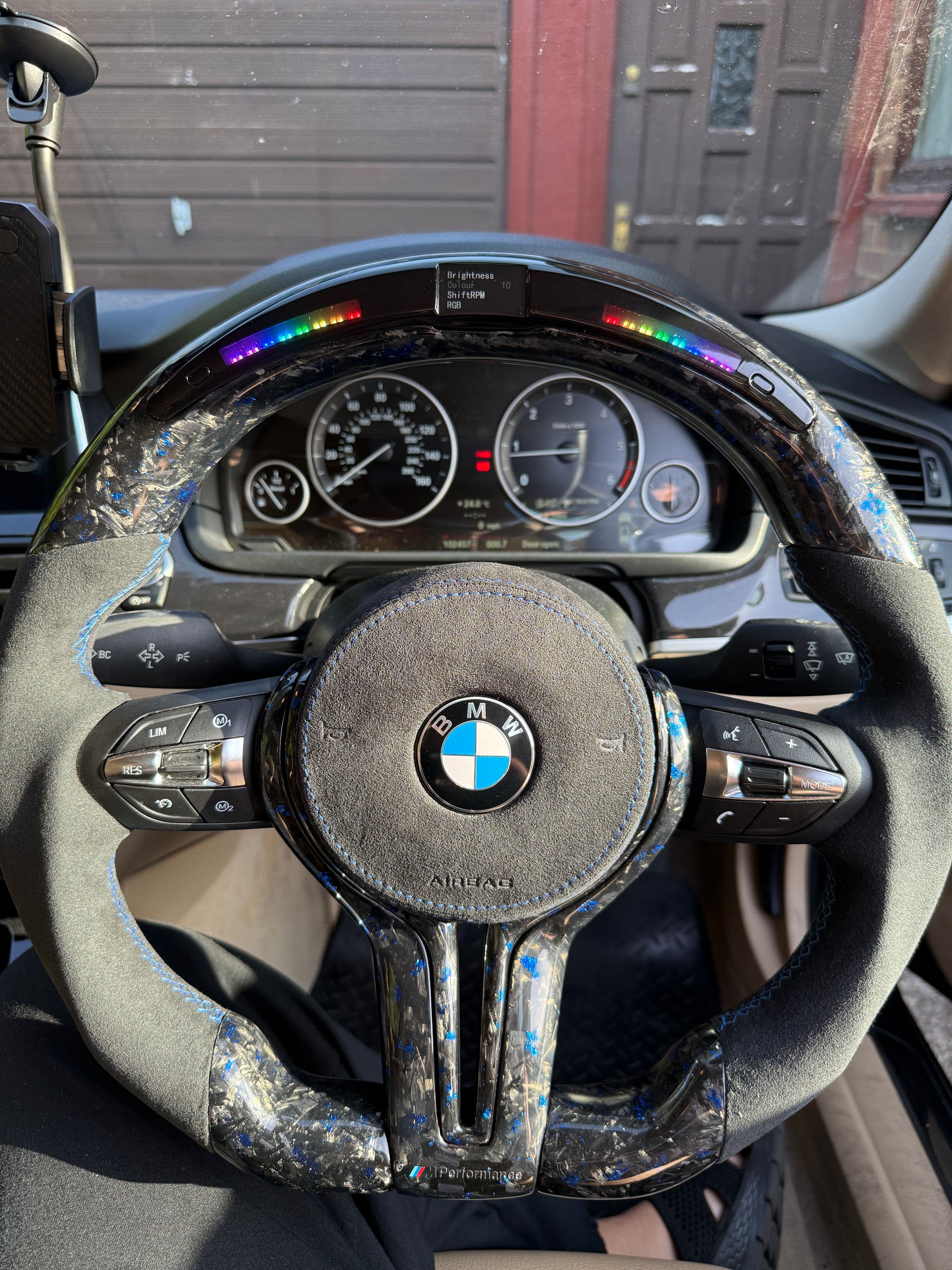 Blue forged carbon led steering wheel